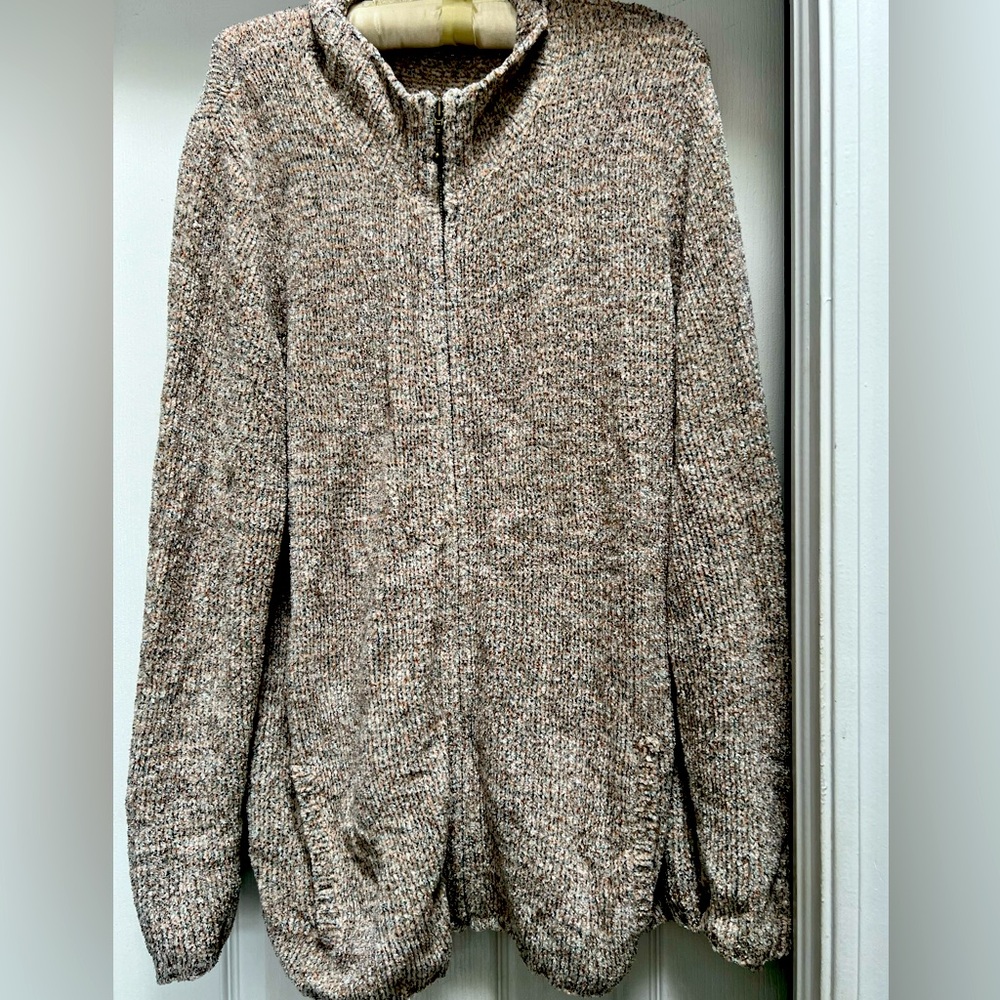 Fluffy and cozy sweater. Multi colored with pockets.